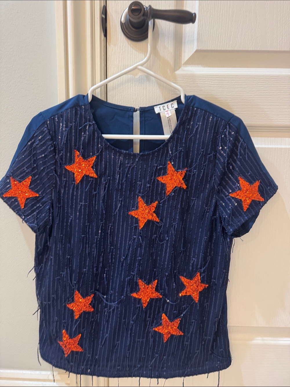 TCEC Navy Blue Short Sleeve Top with Orange Sequin Stars
